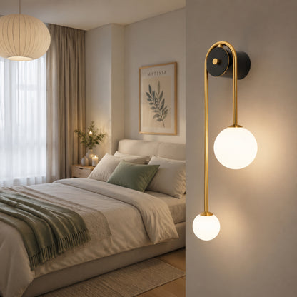 Applique murale chambre doree sur mur double globe design