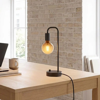 lampe a bureau mur brique vu rapproche industrielle intensite variable