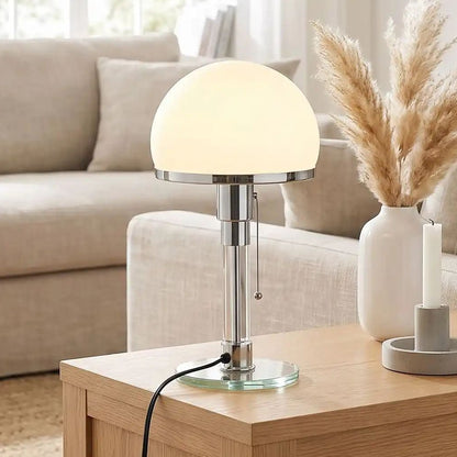 lampe à poser design sejour avec canape vu rapproche bauhaus nordique verre depoli
