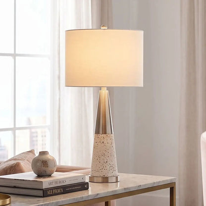 lampe de chevet console modele fer blanc vu rapproche terrazzo doree
