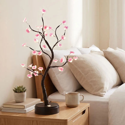 lampe de chevet design chambre avec tasse vu rapproche fleurs de prunier rose led