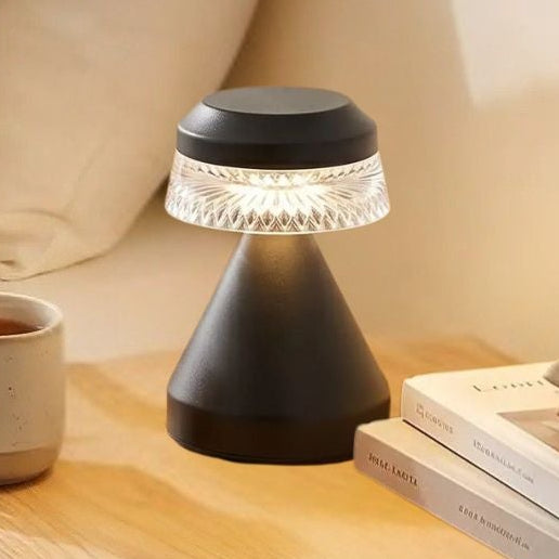 lampe de table sans fil noir chevet avec livre vu rapproche touche dambiance