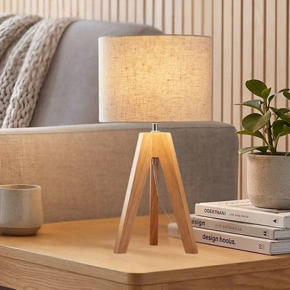 lampe de table sejour vu rapproche trepied scandinave
