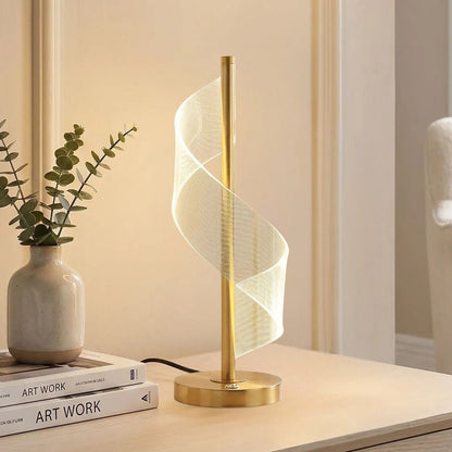 lampe table grande sejour avec plante vu rapproche spirale doree tactile